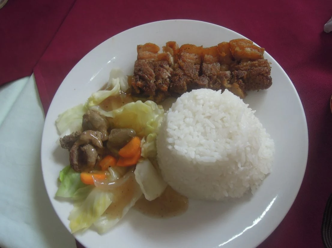 Lechon kawali with rice and chop suey at Lolo Claro’s Restaurant