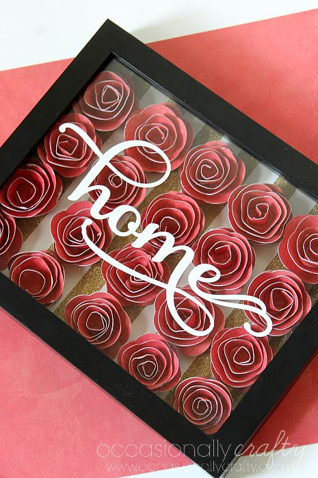 This 3D Rolled Flower Shadowbox makes a perfect housewarming gift, wedding gift, or just a statement piece to add to your home decor!