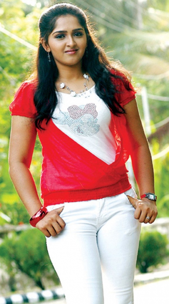 Actress Sanusha Cute Photo Gallery