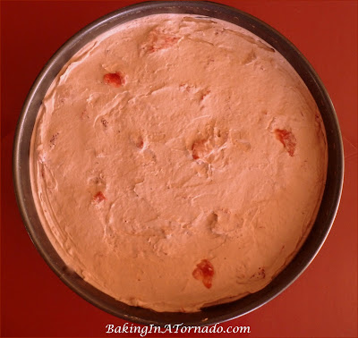 Strawberry Hot Fudge Pie, A fluffy refrigerator pie made with fresh strawberries and hot fudge sauce. Grab a plate and two forks, perfect for sharing with your valentine. | Recipe developed by www.BakingInATornado.com | #recipe #chocolate #pie #ValentinesDay