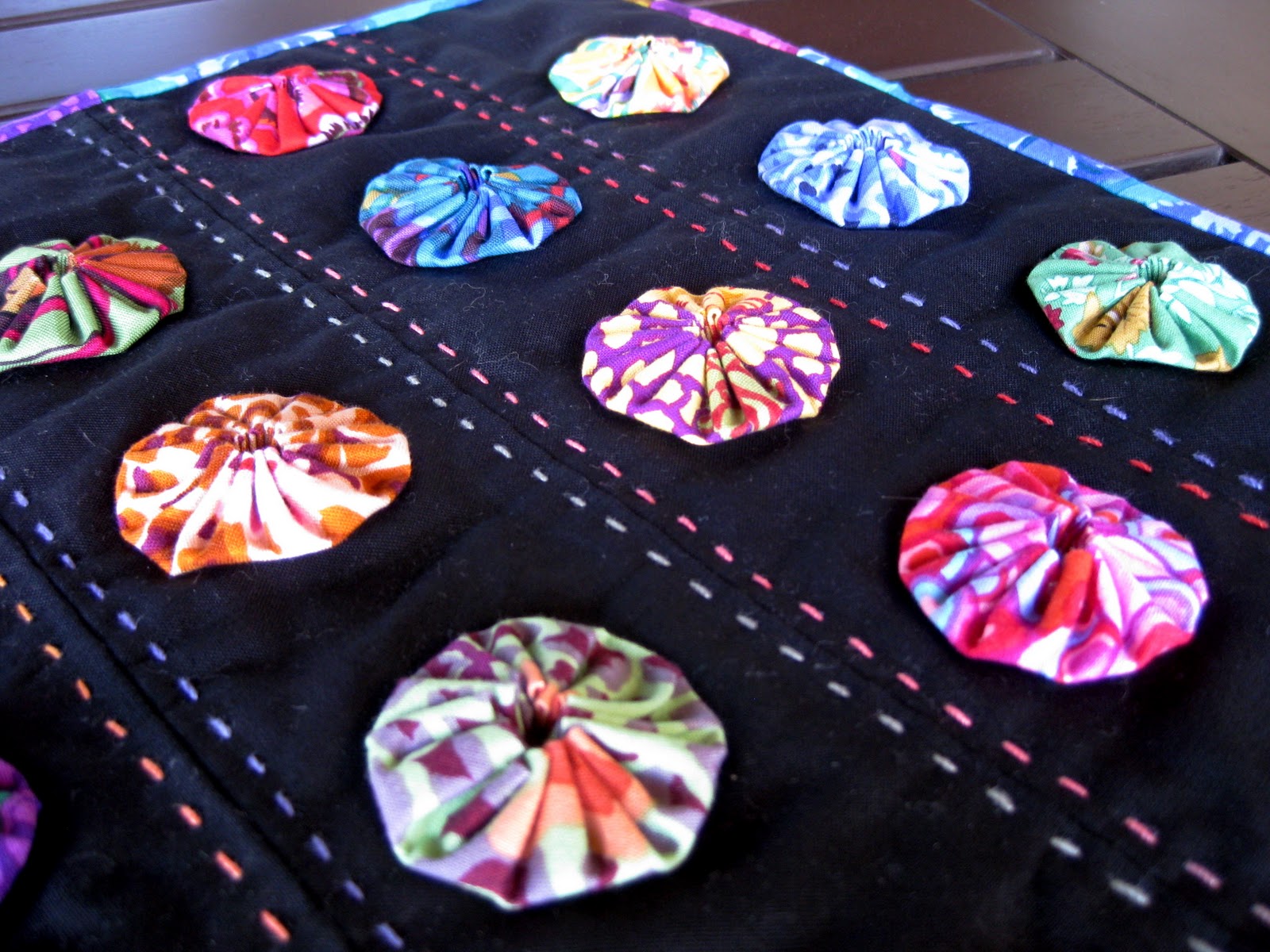 pieceful life: finished yo-yo mini quilt
