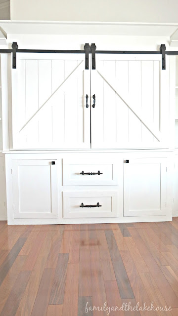 Sliding Barn Door White Entertainment Center Unit - Family and the Lake House - www.familyandthelakehouse.com