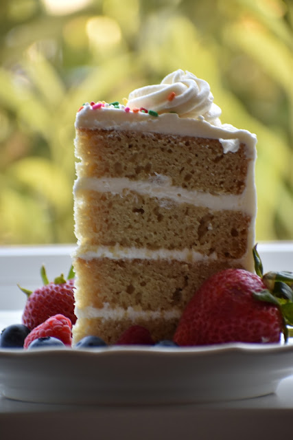 easy gluten free vanilla cake slice on a plate