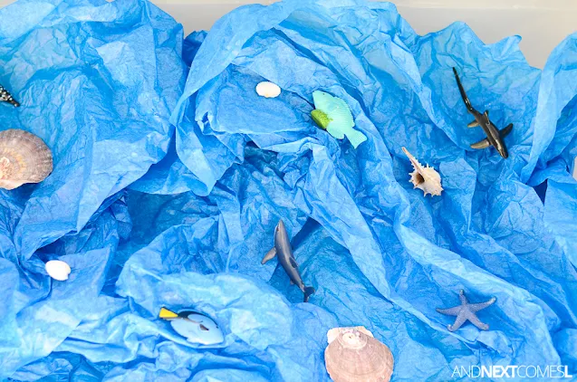 Ocean sensory bin with tissue paper for toddlers and preschoolers