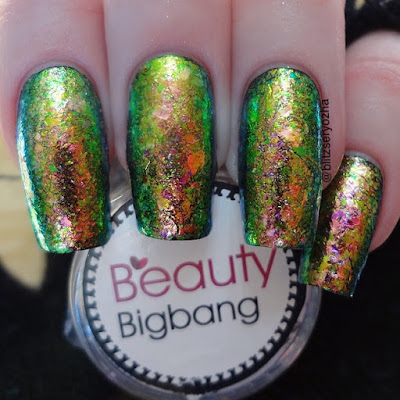 Beauty Bigbang, Iridescent Chameleon Flakes, J2443-9A, over black polish