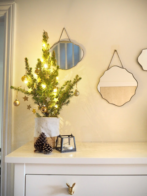 christmas home decor in gold and white featuring baubles and accessories from Dunelm, Laura Ashley, Sainsbury's and Hobbycraft