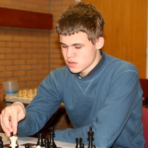 Magnus Carlsen, the Norwegian chess player who came to international  attention after winning the C group of the Corus Chess Tournament in  January 2004 at the age of thirteen, plays against Armenian