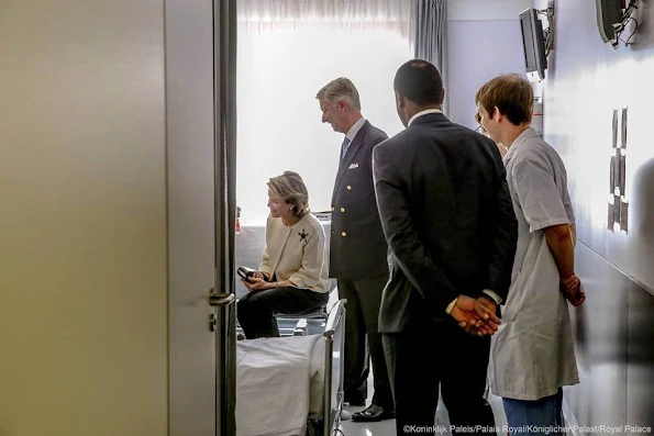 Queen Mathilde and King Philippe of Belgium‬ visited the victims of the attacks of March 22 at the Brussels Airport and the Brussels metro and members of the emergency services and medical staff at St. Michel Hospital in Brussels