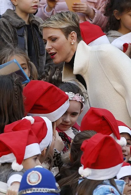 Prince Albert II of Monaco and Princess Charlene of Monaco, Camille Gottlieb and Louis Ducruet attend the Christmas gifts distribution