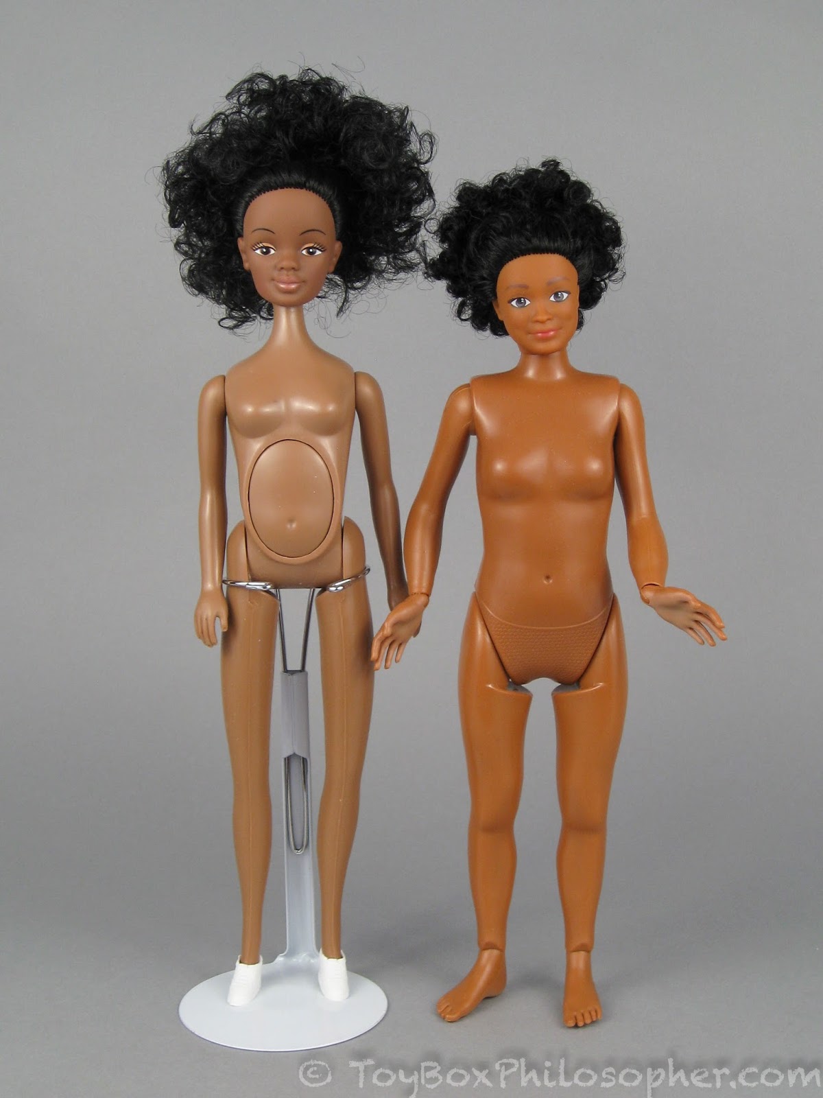 Judith Mommy-to-be doll (left) and Lammily Photographer (right). 