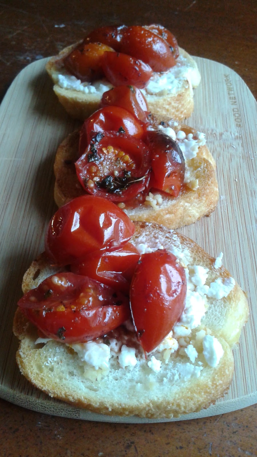 Red Wine Cherry Tomato & Goat Cheese Crostini