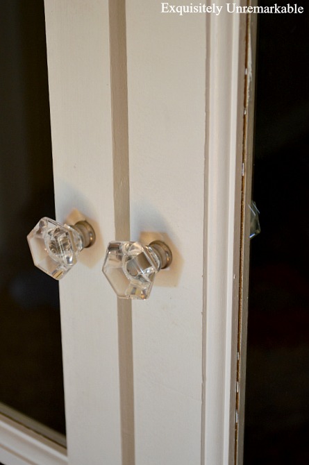 Small Glass Door Knobs on white painted wooded French door 