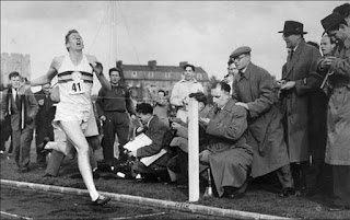 Roger Bannister at the finish line when he was the first person to run a mile under four minutes, May 6, 1954