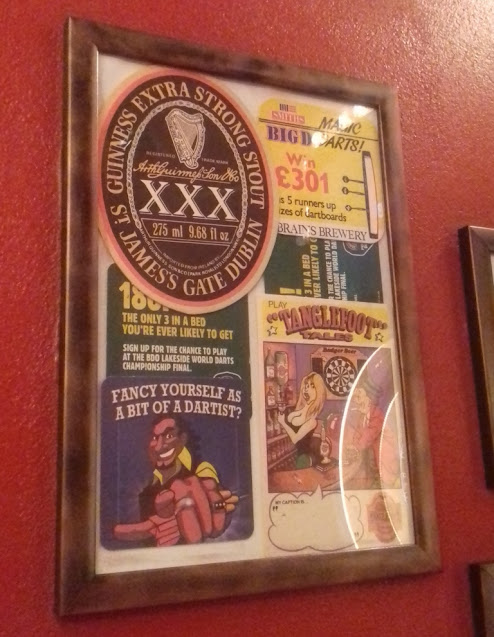 A little bit of the old darts memorabilia to be found on the walls