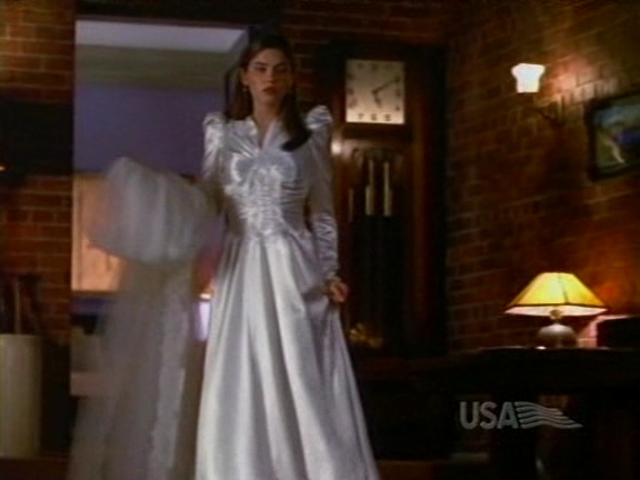 Jodi Lyn O'Keefe - white satin dress.