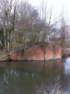 Supporting wall of brick bridge carrying the former Lambourn Valley railway line over the Kennet and Avon Canal, Newbury   