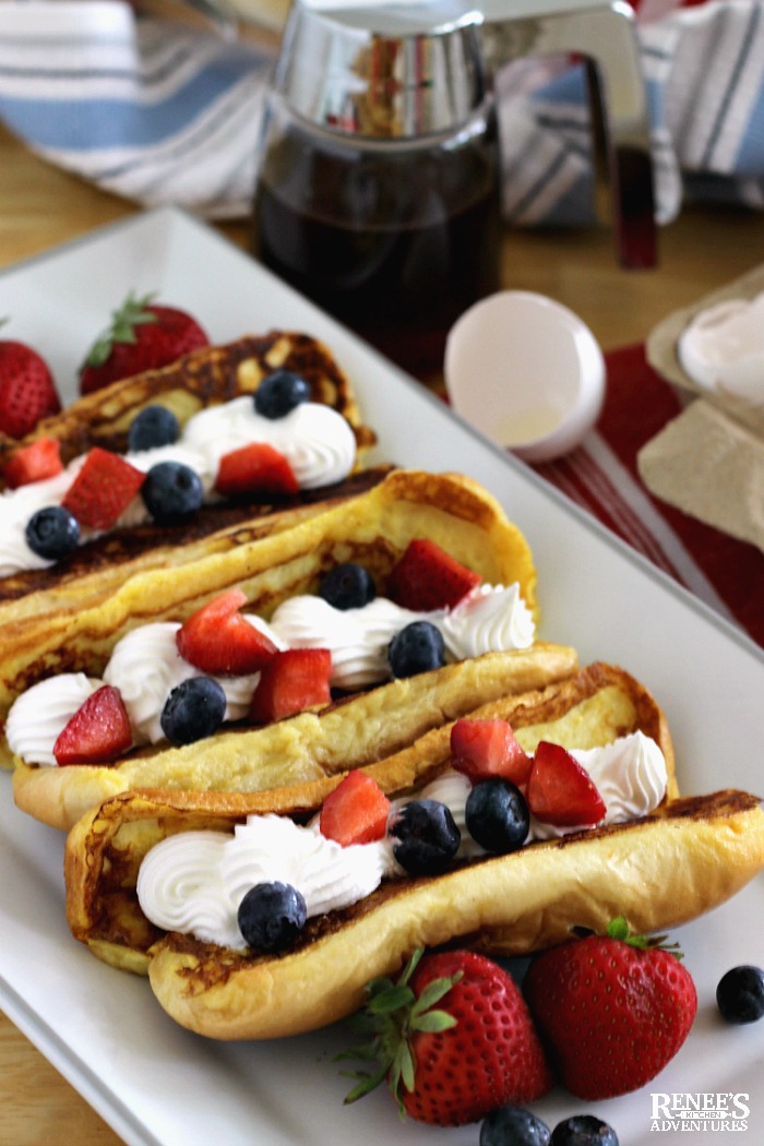 Hot Dog Bun French Toast on platter with berries