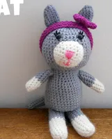 http://www.ravelry.com/patterns/library/celia-cat-crochet-amigurumi-free