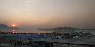 The beautiful bank of Brahmaputra river on the sunset of kite festival with the many people