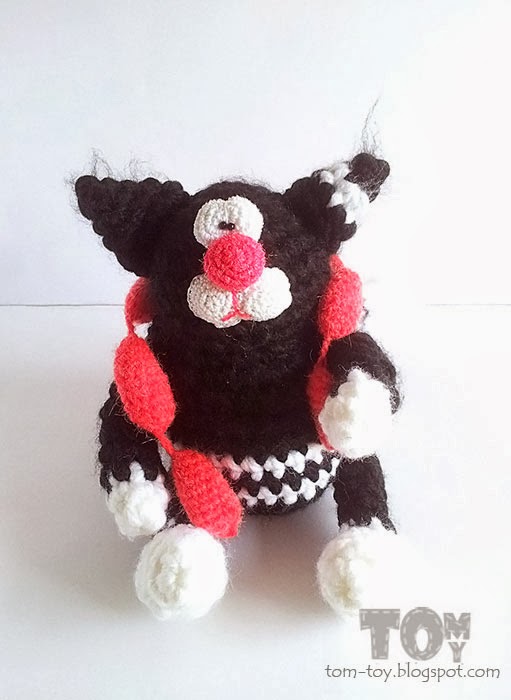 Crochet fat cat with sausages