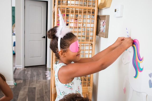 Pin the horn on the unicorn party game