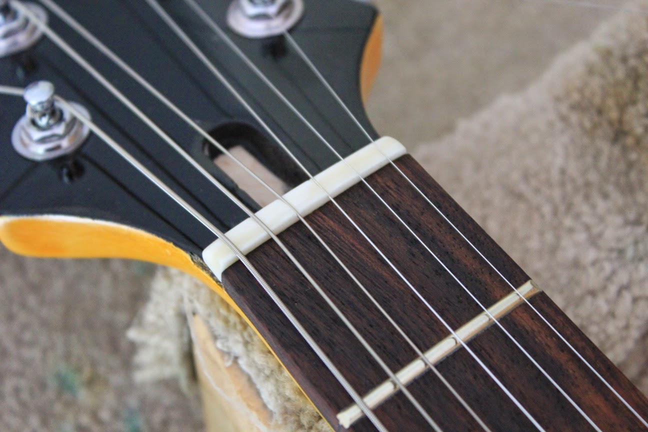 Stratocaster string height at nut