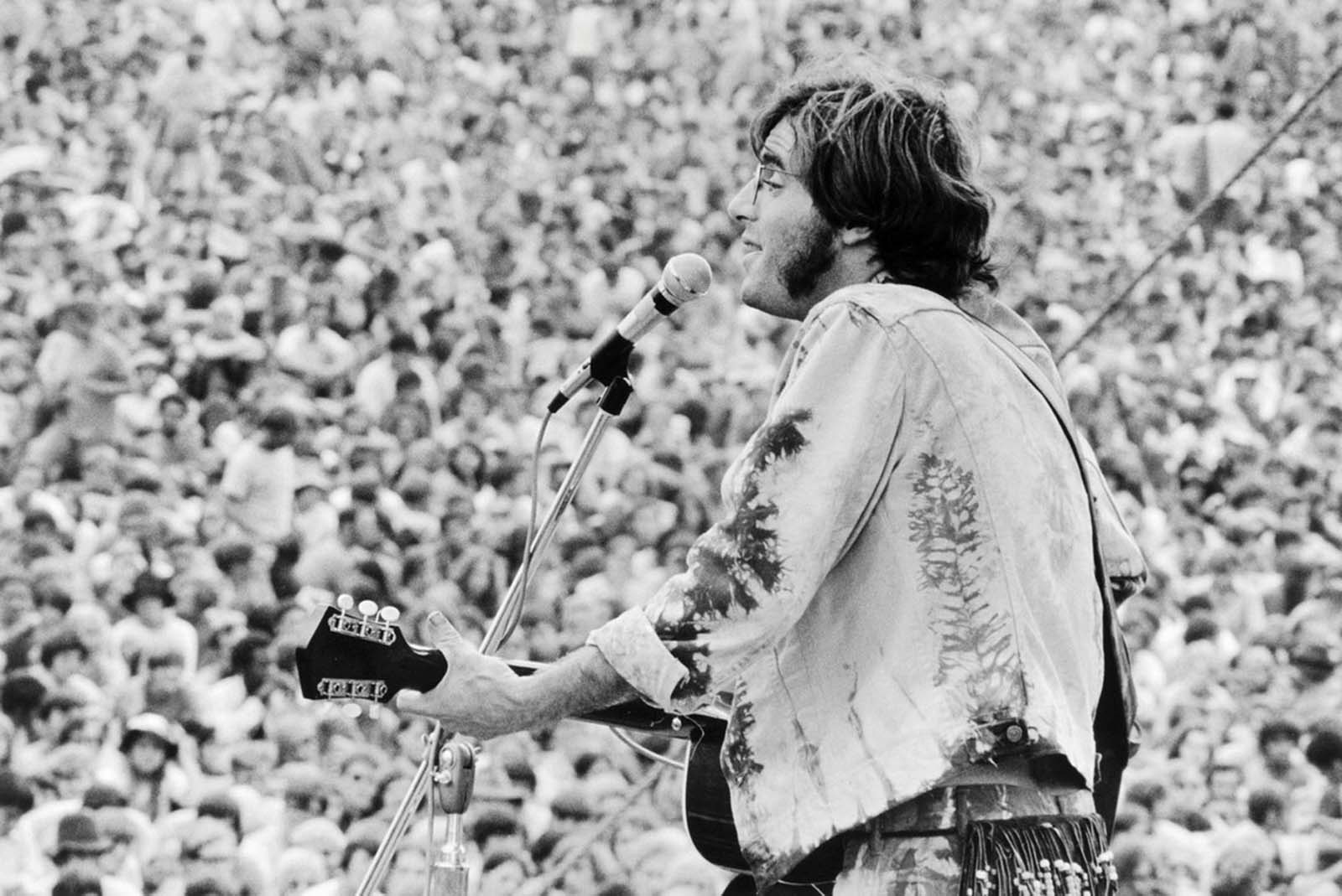 John Sebastian performs at the Woodstock Music & Art Fair in August 1969. 