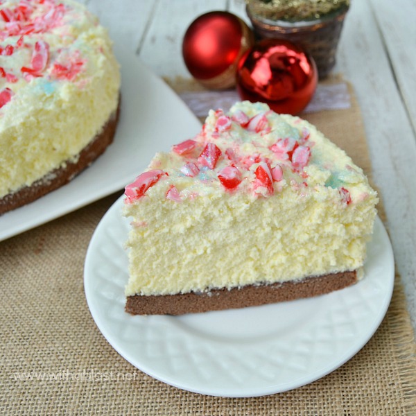 White Christmas Chocolate Mousse Cake ~ The BEST mousse cake EVER ! With a chewy Cake base, creamy Mousse and a taste which will blow you away ~ this is also a make-ahead recipe and yields 12 - 16 slices ,,, perfect for Christmas #MousseCake #Christmas www.withablast.net