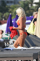Victoria Silvstedt in a skimpy orange bikini