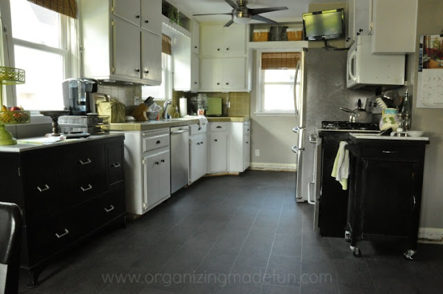 appliances floor kitchen refrigerator stove oven