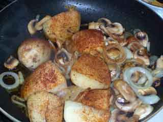 Potatoes in the pan with extras