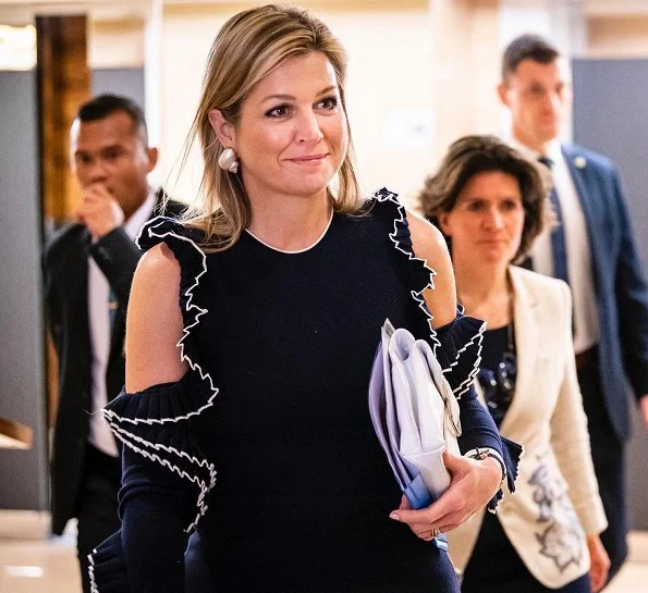 Queen Maxima wore Oscar De La Renta Cold-shoulder ruffled wool midi dress. President Joko Widodo, Kalimantan and Sumatra