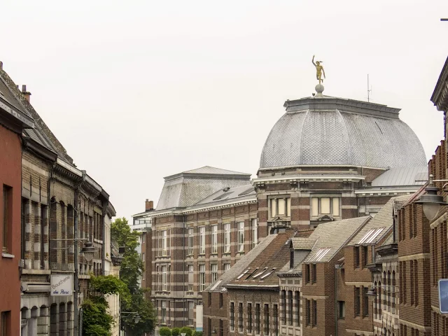What to do in Mons Belgium: Explore architecture and the dome with statue on top