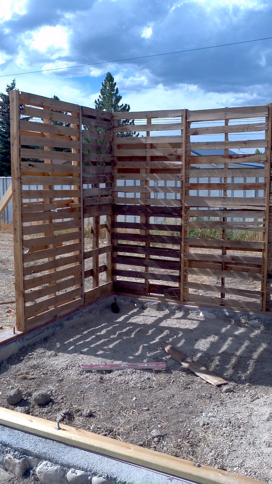 All Of Green Glass Putting up the pallet walls