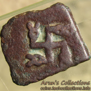 Swastika with a taurine at each arm.