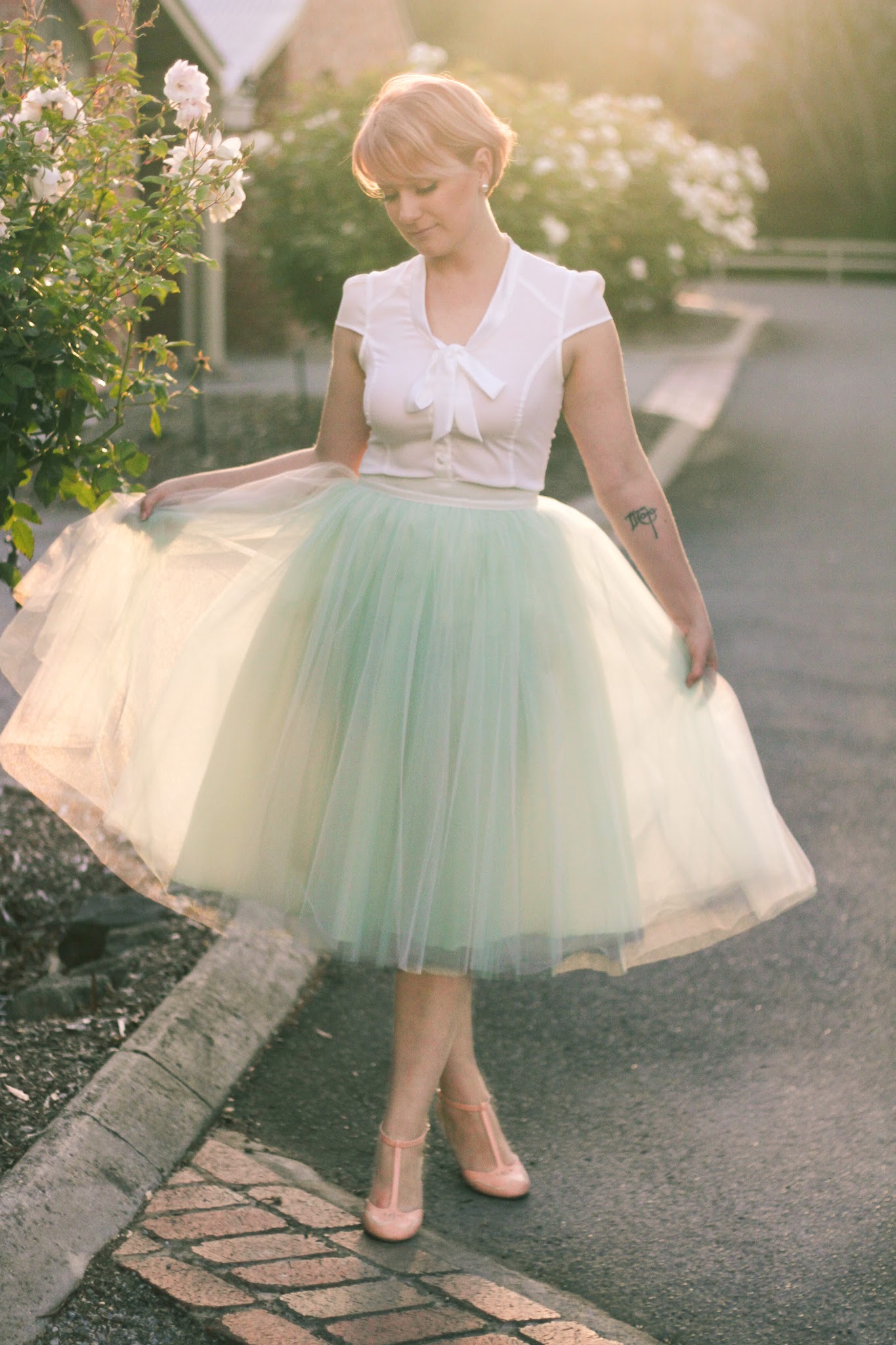 Finding Femme with rose gold hair in romantic mint Alexandra Grecco tulle skirt, Review Australia blouse and Modcloth shoes.