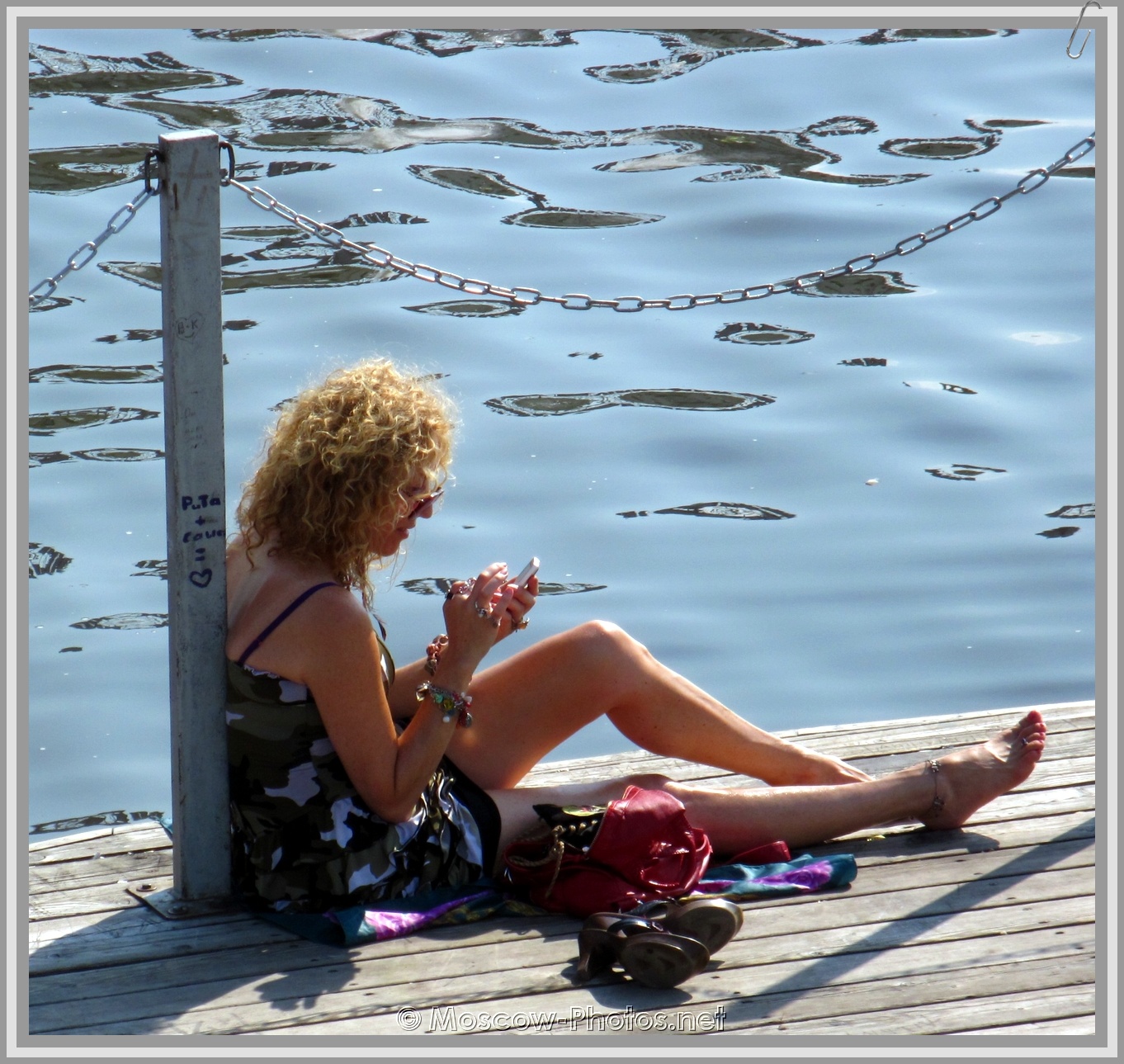 Girl With Phone Near River  