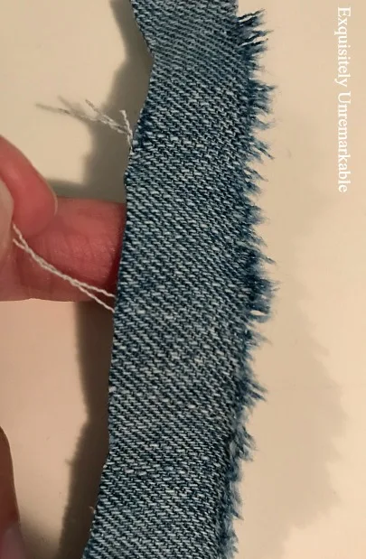 Denim strip with frayed edges