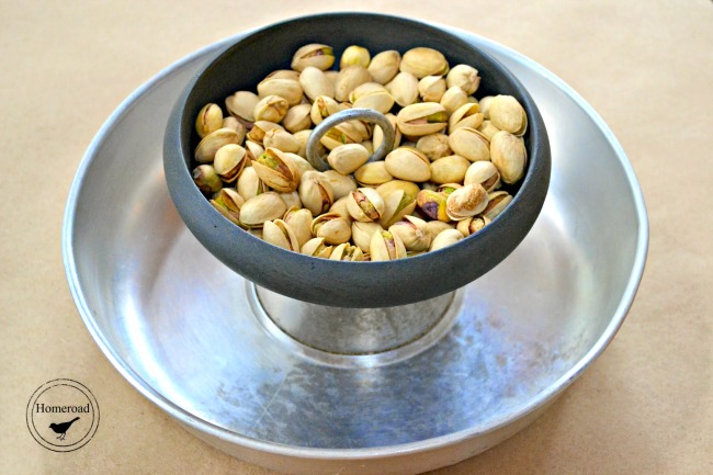 DIY Pistachio nut bowl using repurposed bakeware from the thrift store. www.homeroad.net