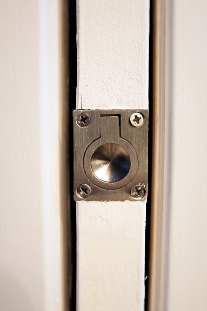 installed pocket door pull