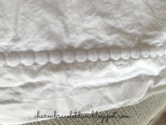 Embroidered white king sized pillow shams