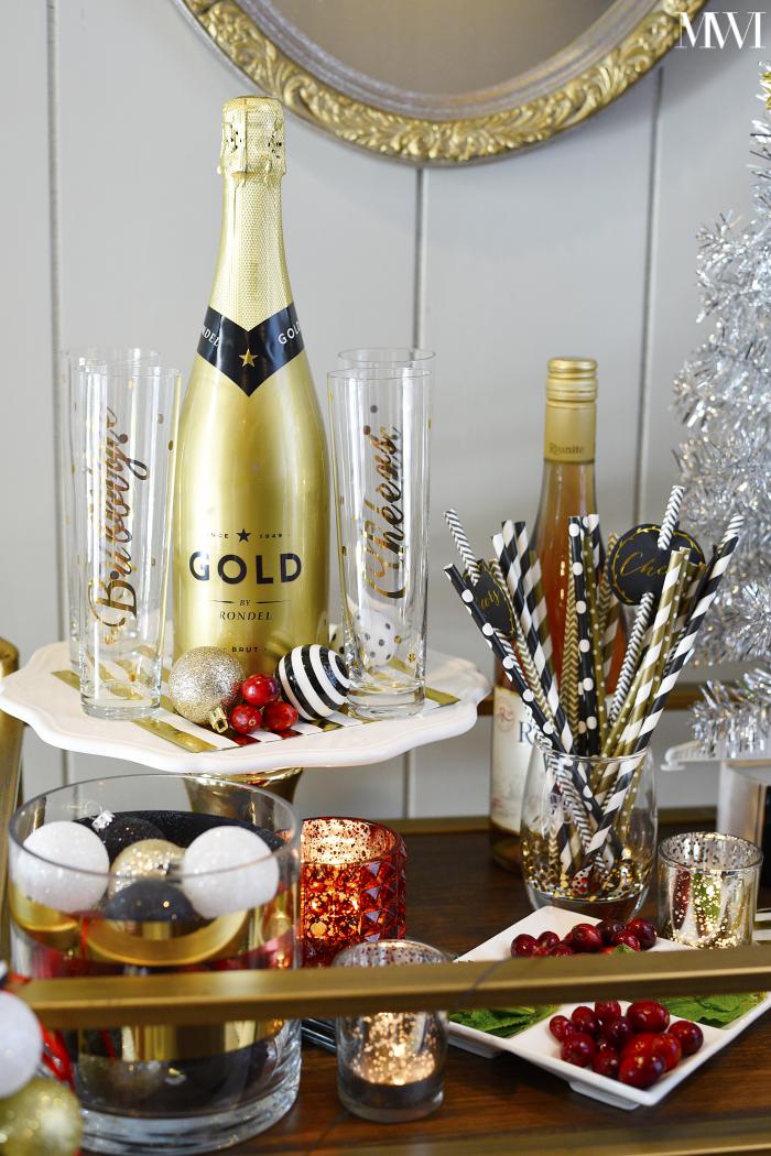 Beautifully styled bar cart that is ready for holiday champagne cocktails!