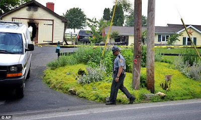 AFTER A BITTER DIVORCE Mother kills her two children, shoots family dog, sets fire to her home and commits suicide