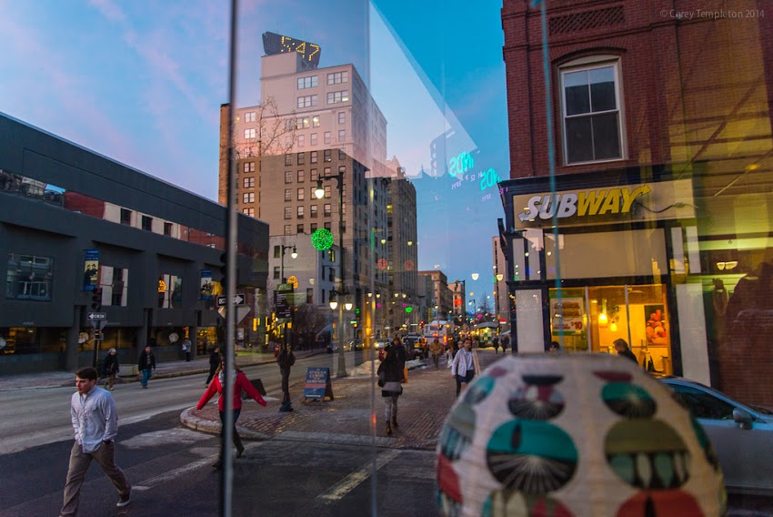 Portland, Maine USA March 2014 photo by Corey Templeton of downtown Congress Street through a glass window.