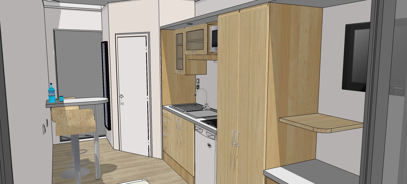 Agencement intérieur du container aménagé en studio : cuisine équipée