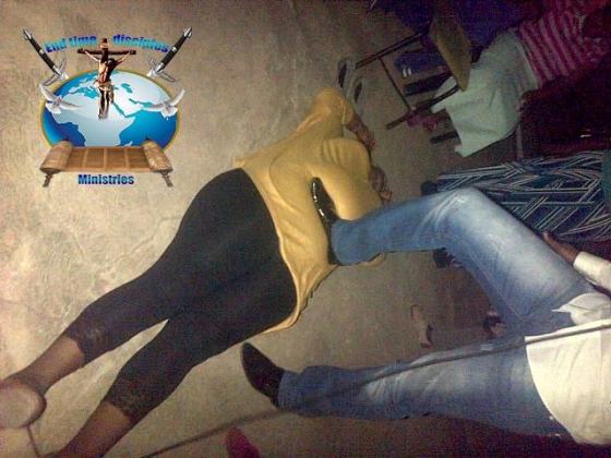 Photos: Controversial SA Pastor Steps On A Woman's Stomach During Deliverance