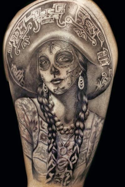 Vemos la foto de un tatuaje de catrina con sombrero charro
