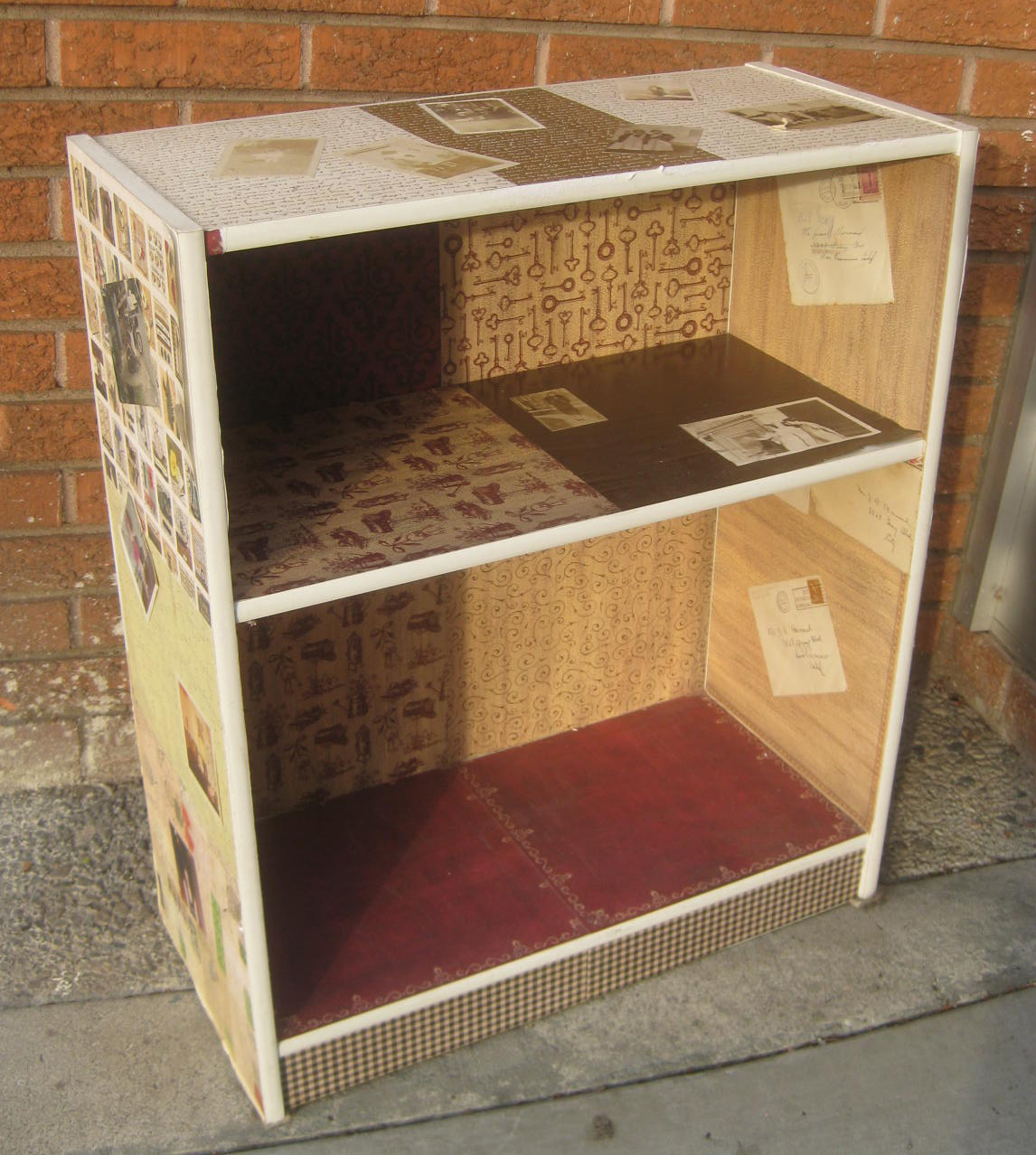 UHURU FURNITURE & COLLECTIBLES SOLD Bookcase Decorated with