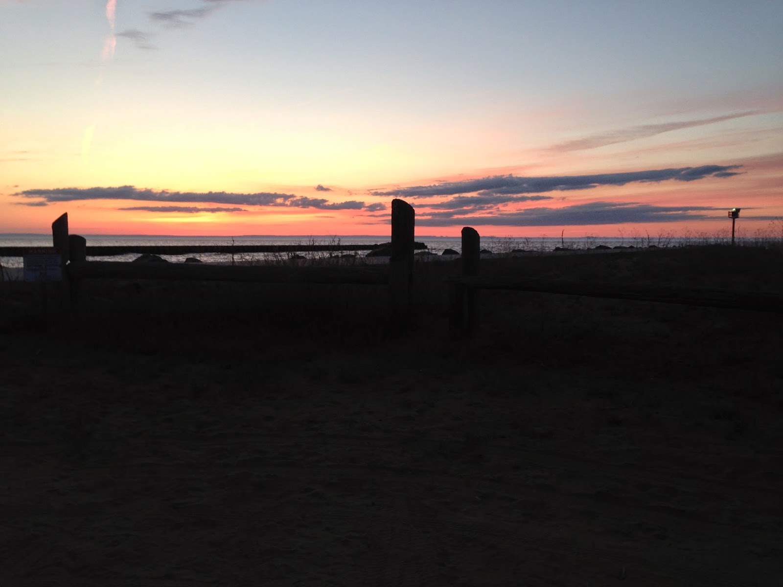 Port Wing Passages Sunset at the pier and light beacon