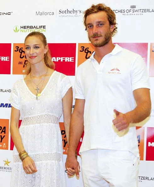 Pierre Casiraghi and Beatrice Borromeo at Palma Royal Nautical Club. Beatrice wore TopShop, Giambatista Valli lace dress